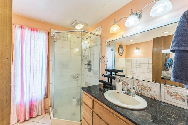 4004 W Taft Dr, Spokane, WA 99208 - bathroom featuring a stall shower, vanity, and tile patterned flooring