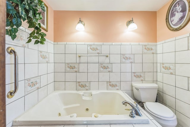 4004 W Taft Dr, Spokane, WA 99208 - bathroom with toilet, a whirlpool tub, and tile walls