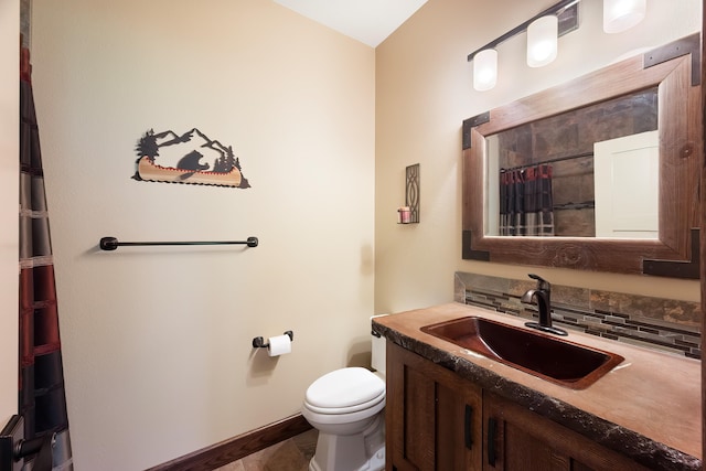 16510 N Brannon Ln, Spokane, WA 99208 - full bathroom with vanity, toilet, curtained shower, and baseboards
