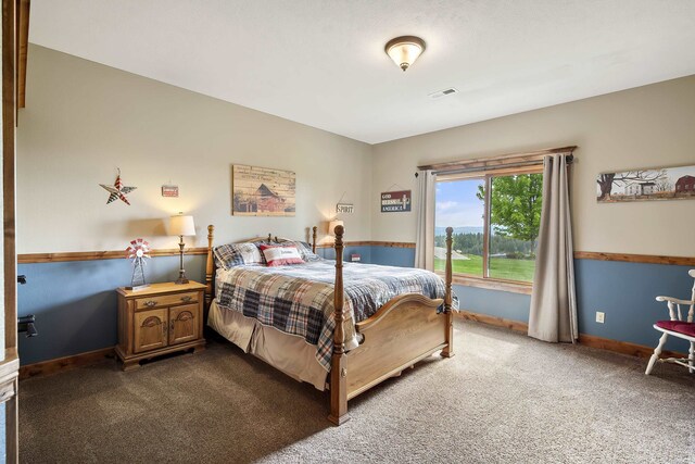 16510 N Brannon Ln, Spokane, WA 99208 - bedroom featuring dark colored carpet and baseboards