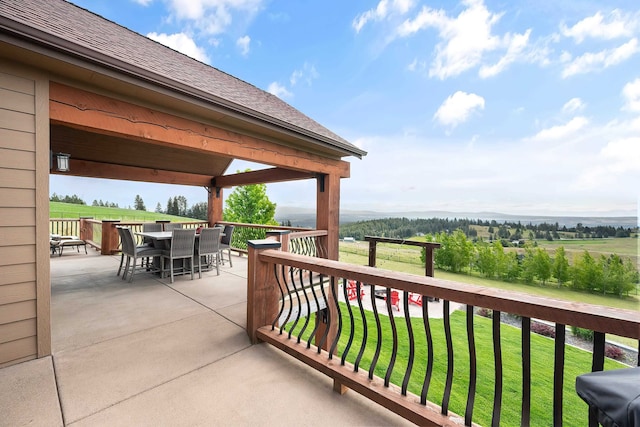 16510 N Brannon Ln, Spokane, WA 99208 - balcony with outdoor dining space and a view of countryside