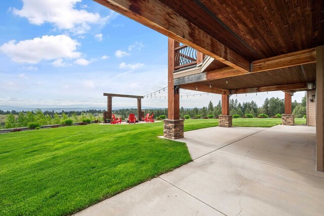 16510 N Brannon Ln, Spokane, WA 99208 - view of grassy yard featuring a patio area