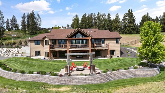 16510 N Brannon Ln, Spokane, WA 99208 - rear view of property with a patio, a wooden deck, and a fire pit