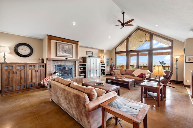 16510 N Brannon Ln, Spokane, WA 99208 - living area with a ceiling fan, finished concrete flooring, a tile fireplace, high vaulted ceiling, and baseboards