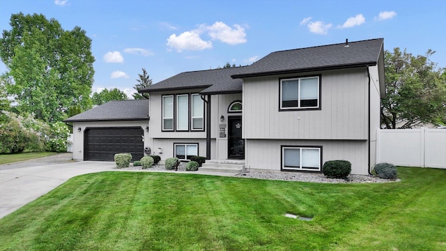 18920 E Augusta Ln, Spokane Valley, WA 99016 - view of front of home featuring an attached garage, driveway, and a shingled roof