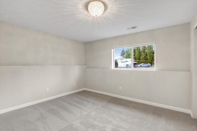 18920 E Augusta Ln, Spokane Valley, WA 99016 - carpeted spare room featuring a chandelier and baseboards