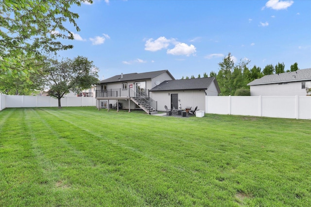 18920 E Augusta Ln, Spokane Valley, WA 99016 - rear view of house featuring stairs and a deck