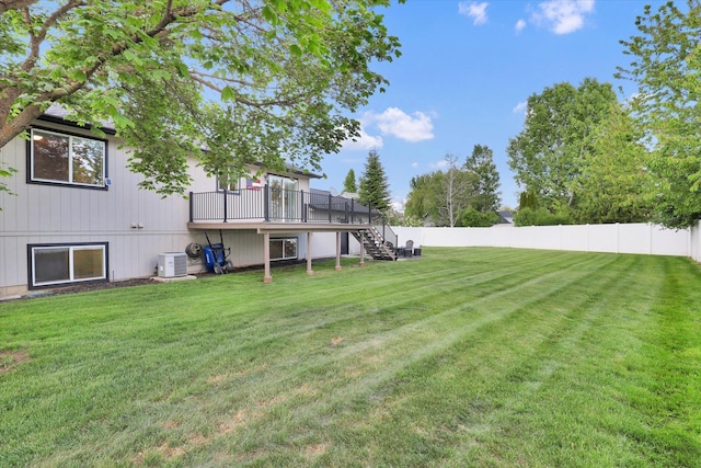 18920 E Augusta Ln, Spokane Valley, WA 99016 - view of yard with stairs, a wooden deck, ac unit, and central AC unit