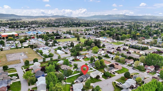 18920 E Augusta Ln, Spokane Valley, WA 99016 - aerial view of property's location with a mountain backdrop and nearby suburban area