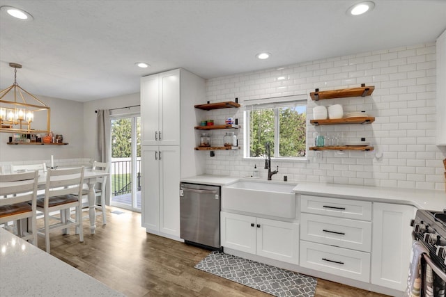 18920 E Augusta Ln, Spokane Valley, WA 99016 - kitchen with stainless steel dishwasher, a sink, open shelves, a chandelier, and tasteful backsplash