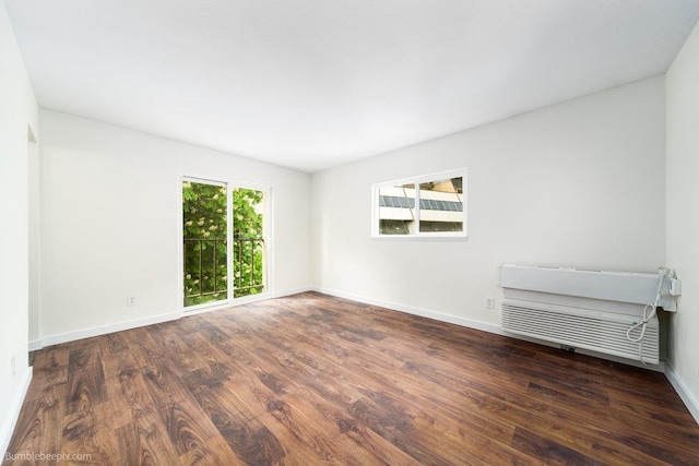 707 W 6th Ave Unit 41, Spokane, WA 99204 - unfurnished room featuring wood finished floors and baseboards