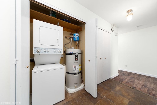 707 W 6th Ave Unit 41, Spokane, WA 99204 - laundry area with stacked washer and clothes dryer, water heater, and baseboards