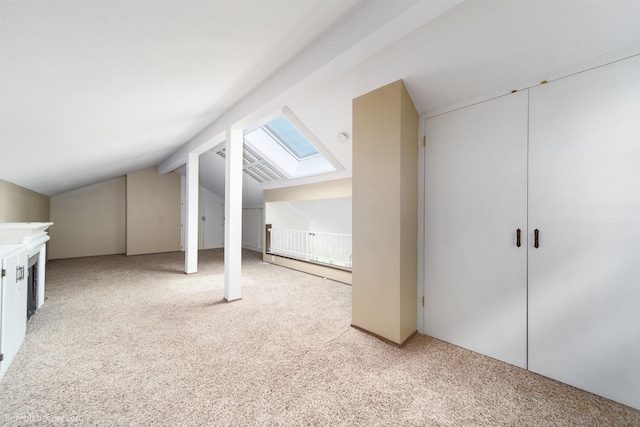 707 W 6th Ave Unit 41, Spokane, WA 99204 - additional living space with light carpet, lofted ceiling, and a skylight
