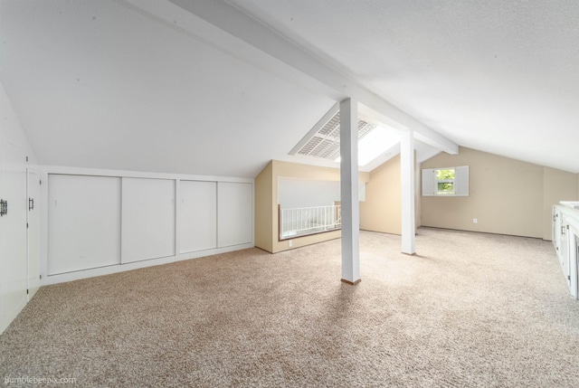707 W 6th Ave Unit 41, Spokane, WA 99204 - additional living space with lofted ceiling and light carpet