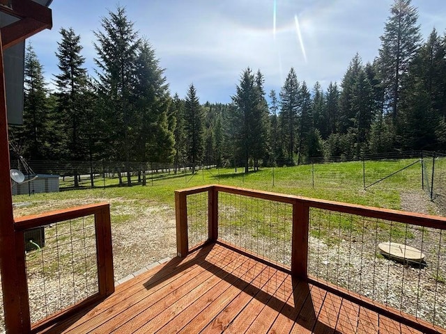 1108 Basin Rd, Colville, WA 99114 - wooden terrace featuring a forest view