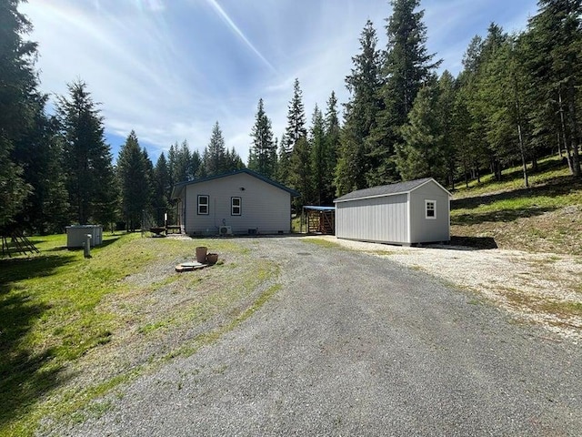 1108 Basin Rd, Colville, WA 99114 - exterior space with a view of trees