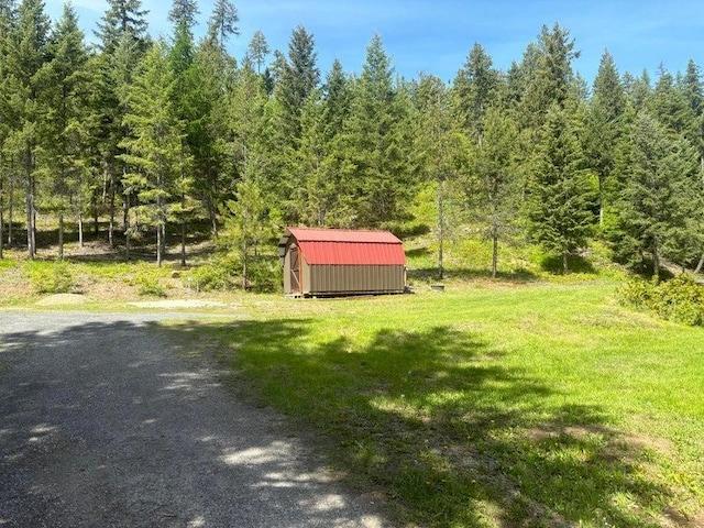 1108 Basin Rd, Colville, WA 99114 - view of green lawn with a forest view