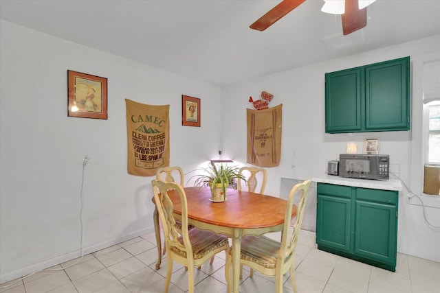 228 W Poplar St, Tekoa, WA 99033 - dining space with a ceiling fan and light tile patterned floors