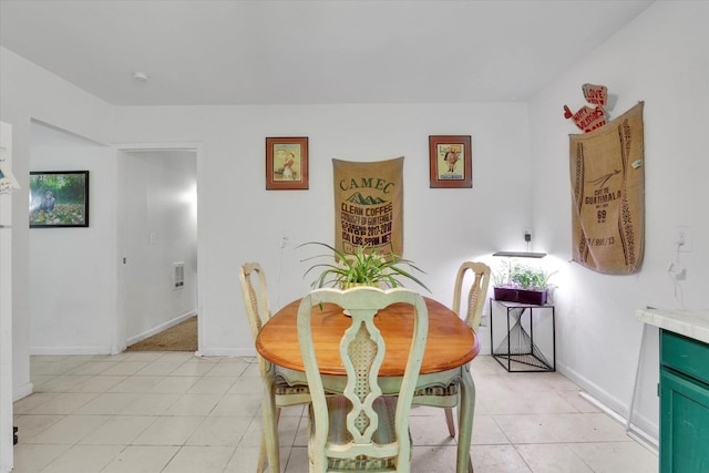 228 W Poplar St, Tekoa, WA 99033 - dining room with baseboards and light tile patterned flooring