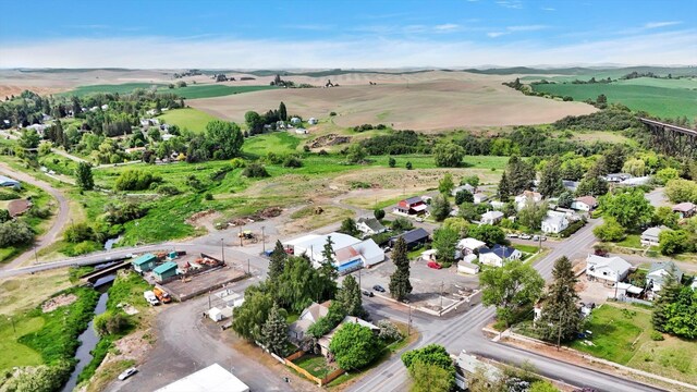 228 W Poplar St, Tekoa, WA 99033 - aerial overview of property's location featuring rural landscape