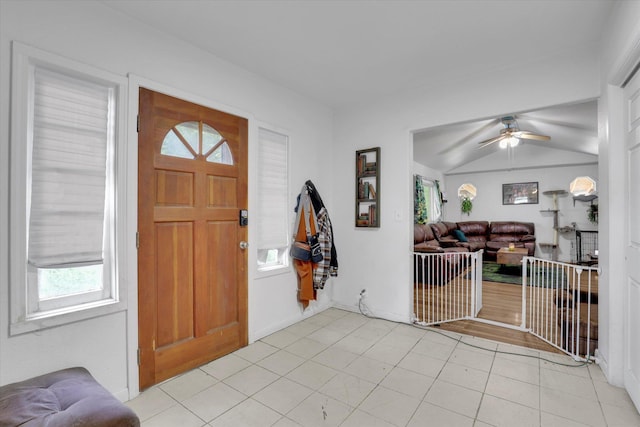 228 W Poplar St, Tekoa, WA 99033 - entryway featuring a ceiling fan, light tile patterned floors, and baseboards
