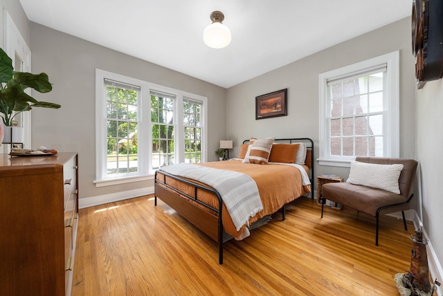 918 W 18th Ave, Spokane, WA 99203 - bedroom featuring light wood-style floors and baseboards