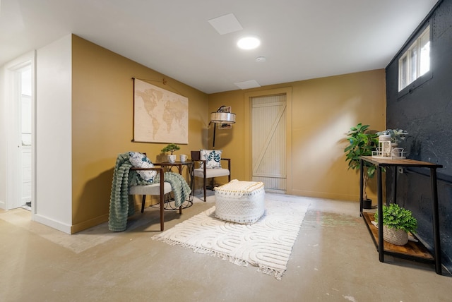 918 W 18th Ave, Spokane, WA 99203 - sitting room with concrete flooring and baseboards