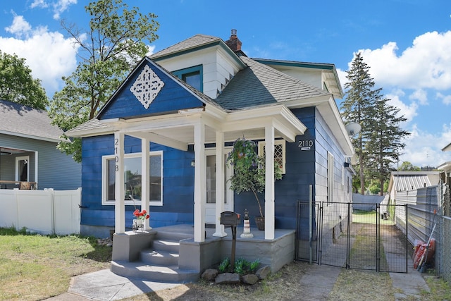2108 E Pacific Avenue 2110E Pacific Ave Spokane, Wa 99202, Spokane, WA 99202 - view of front of home with a porch, a gate, roof with shingles, and a chimney