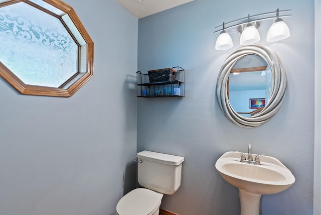 11510 E 20th Ave, Spokane Valley, WA 99206 - bathroom featuring toilet, a skylight, and a sink