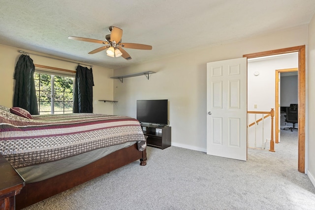 11510 E 20th Ave, Spokane Valley, WA 99206 - bedroom with carpet floors, baseboards, and a ceiling fan