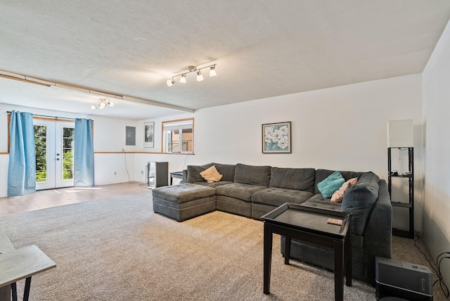 11510 E 20th Ave, Spokane Valley, WA 99206 - living area with french doors and a textured ceiling