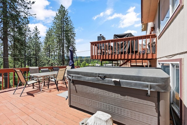 11510 E 20th Ave, Spokane Valley, WA 99206 - deck featuring a hot tub and outdoor dining space