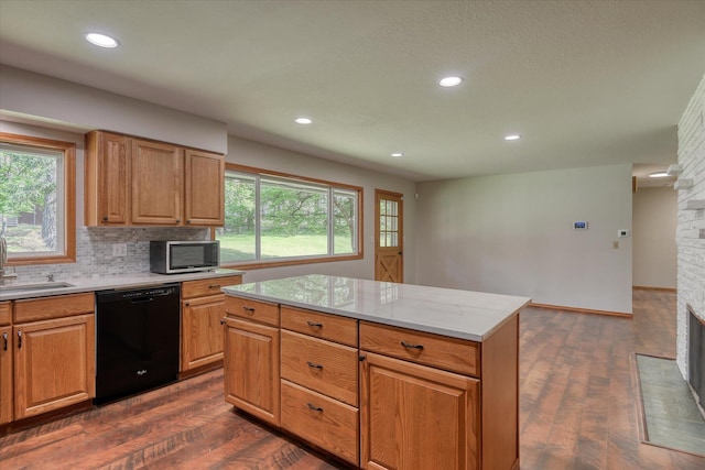 17614 N Palomino Rd, Colbert, WA 99005 - kitchen featuring black dishwasher, stainless steel microwave, dark wood finished floors, recessed lighting, and backsplash