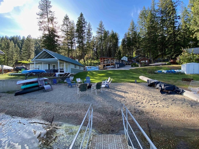 4053 Hanleys Hvn, Loon Lake, WA 99148 - surrounding community featuring a yard and view of wooded area
