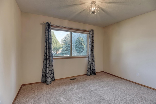 3023 S Winthrop Ln, Spokane, WA 99203 - empty room with carpet floors, baseboards, and a textured ceiling