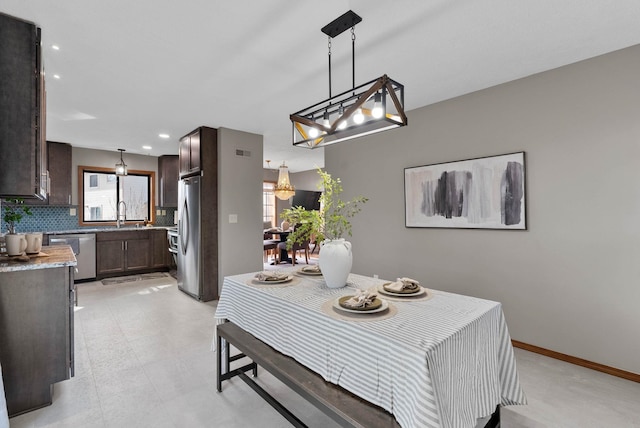 2311 S Mamer Ct, Spokane Valley, WA 99216 - dining area featuring a chandelier, recessed lighting, and baseboards