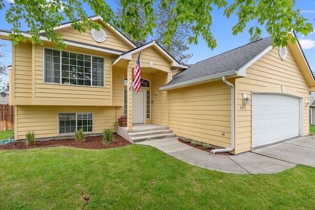 6831 N Cambridge Ln, Spokane, WA 99208 - view of front of home featuring a front lawn, a shingled roof, and driveway