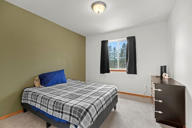 6831 N Cambridge Ln, Spokane, WA 99208 - bedroom featuring carpet floors and baseboards