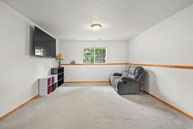6831 N Cambridge Ln, Spokane, WA 99208 - unfurnished room with carpet flooring, baseboards, and a textured ceiling