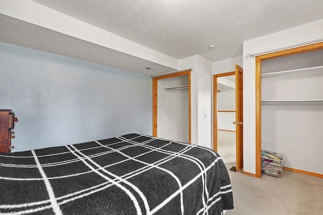 6831 N Cambridge Ln, Spokane, WA 99208 - carpeted bedroom with a textured ceiling and a closet