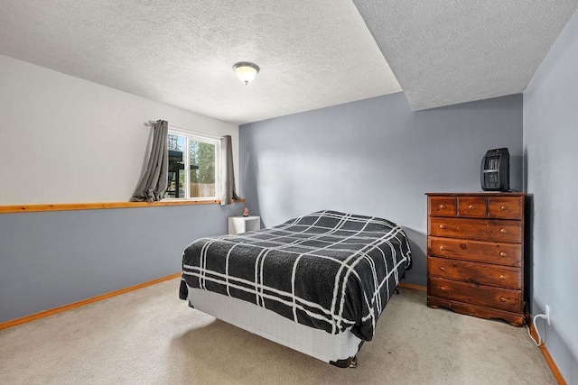6831 N Cambridge Ln, Spokane, WA 99208 - bedroom with carpet, baseboards, and a textured ceiling