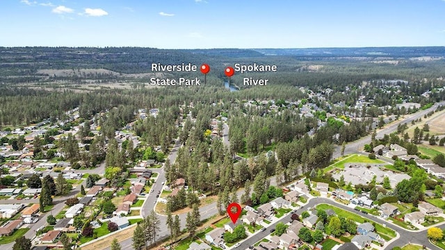 6831 N Cambridge Ln, Spokane, WA 99208 - view of property location featuring a forest and nearby suburban area