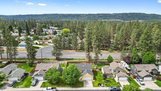 6831 N Cambridge Ln, Spokane, WA 99208 - aerial perspective of suburban area featuring a forest