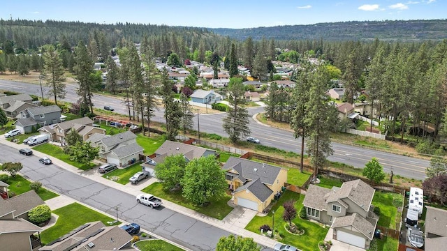 6831 N Cambridge Ln, Spokane, WA 99208 - aerial view of residential area with a heavily wooded area