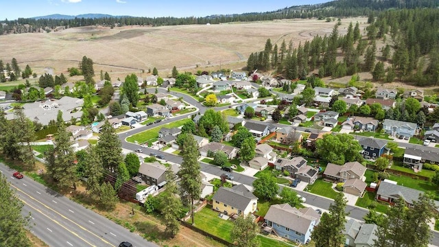 6831 N Cambridge Ln, Spokane, WA 99208 - aerial overview of property's location with nearby suburban area