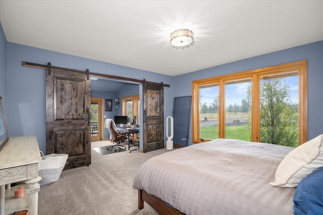 16010 W Jade Ln, Medical Lake, WA 99022 - carpeted bedroom with a barn door and a desk