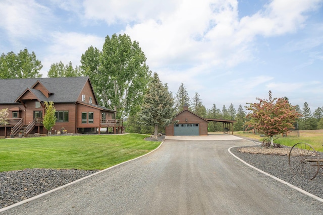 16010 W Jade Ln, Medical Lake, WA 99022 - view of front of property featuring driveway, a front yard, an outbuilding, and a garage