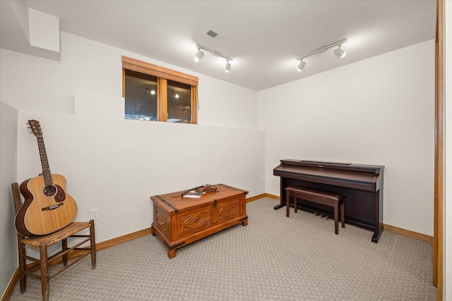 16010 W Jade Ln, Medical Lake, WA 99022 - living area with baseboards, light carpet, and track lighting