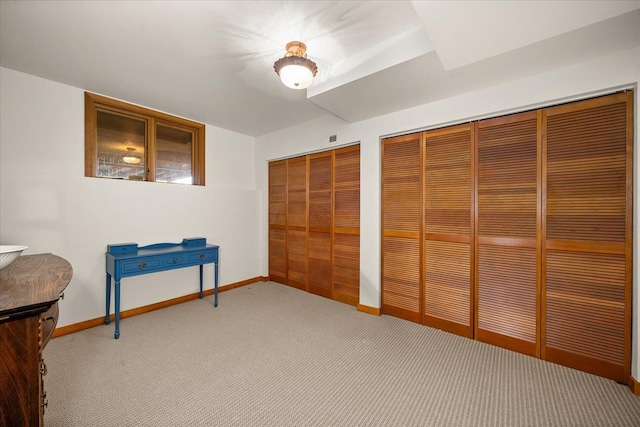 16010 W Jade Ln, Medical Lake, WA 99022 - unfurnished bedroom with carpet floors, baseboards, and two closets