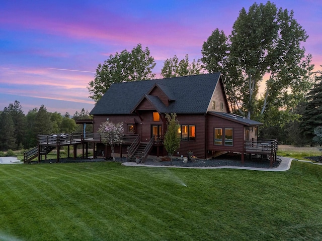 16010 W Jade Ln, Medical Lake, WA 99022 - view of front of house featuring stairs, a yard, and a deck